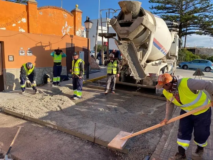 Obreros, trabajando.